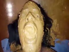 smearing an obedient ebony slut with crap